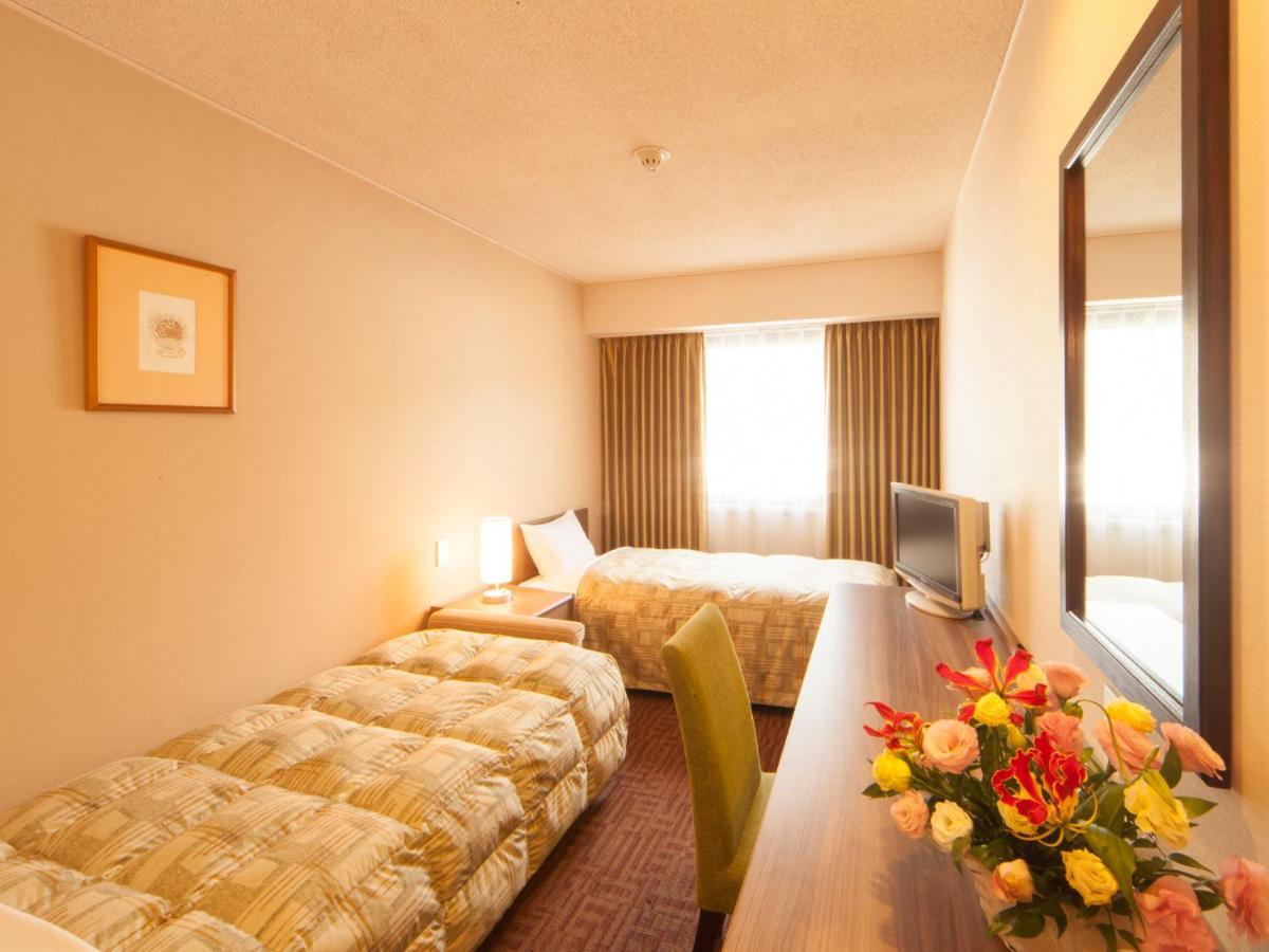 Hotel Pearl City Kesennuma Rum bild