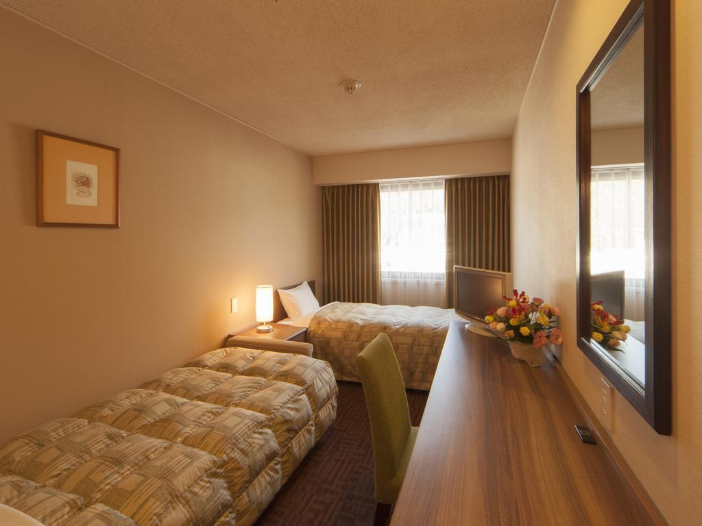 Hotel Pearl City Kesennuma Rum bild